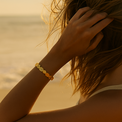 Ariel | Refleksjoner av gylden sand