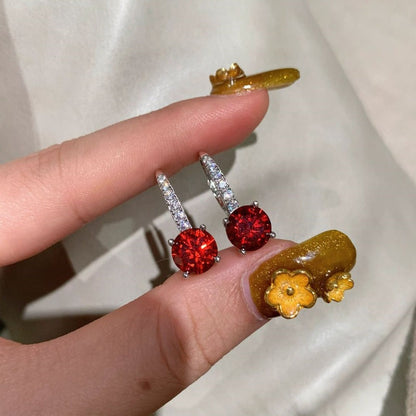 Celira Orvane Øredobber | Hvit Gull